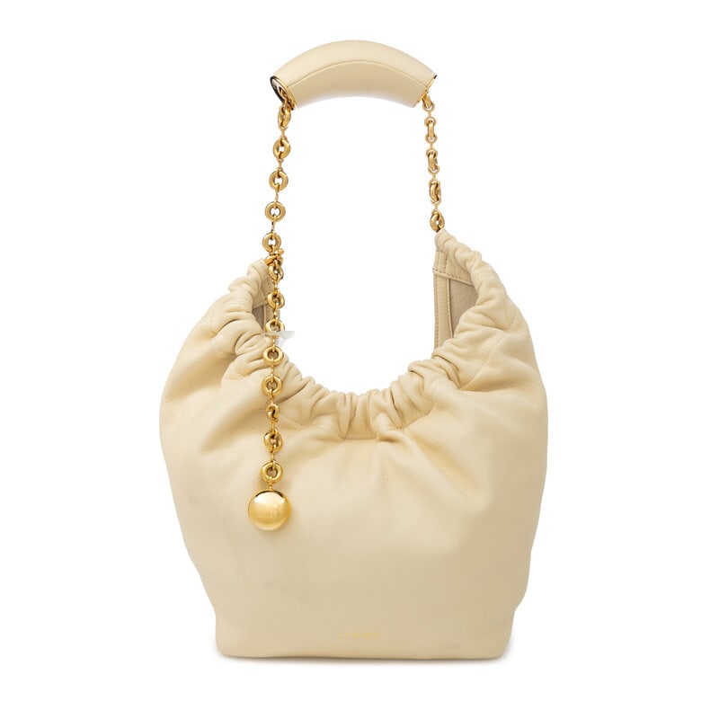 LOEWE, SQUEEZE BAG IN CREAM LEATHER: LOEWE, SQUEEZE BAG IN CREAM LEATHER Squeeze bag in cream lambskin leather. Magnetic snap closure and metal chain and leather strap. Label: Loewe Style/Serial No.: Unmarked Date: 2010's-2020's