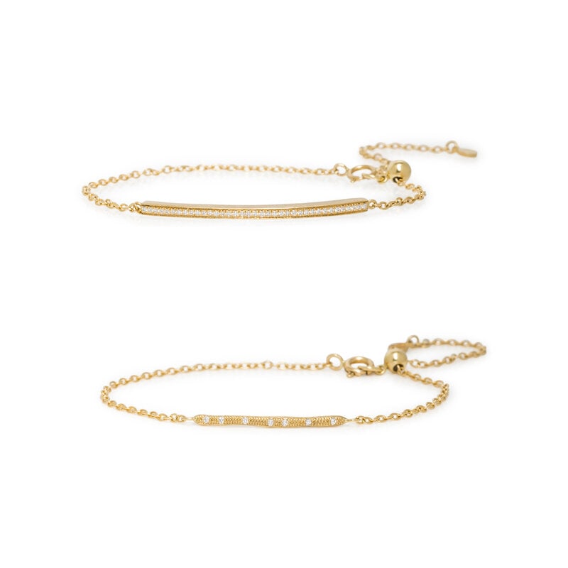 PAIR OF YELLOW GOLD AND DIAMOND BRACELETS (1 of 2)