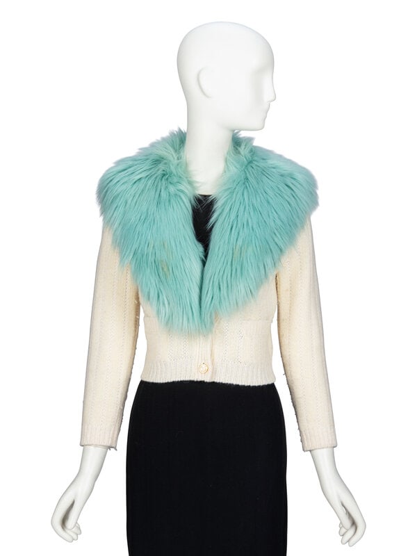 GUCCI, FAUX FUR-COLLAR CROPPED CARDGIAN: GUCCI, FAUX FUR-COLLAR CROPPED CARDGIAN As seen in the opening runway look of the Spring/Summer 2022 Ready-to-Wear collection by Alessandro Michele for Gucci. Cropped fitted cardigan in cream wool/cas