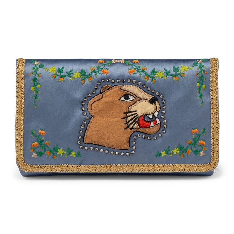 GUCCI, EMBELLISHED "GUCCIFICATION" CLUCH: GUCCI, EMBELLISHED "GUCCIFICATION" CLUCH "Guccification" clutch in sky blue silk satin with floral embroidery, metallic gold trim, and rhinestone embellishments throughout. Label: Gucci
