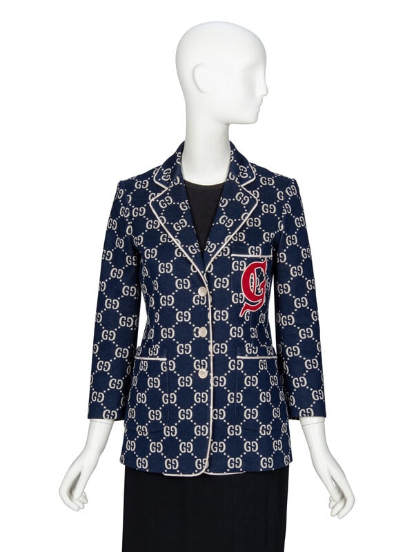 GUCCI, MONOGRAM BLAZER: GUCCI, MONOGRAM BLAZER Blazer in navy & cream GG monogram cotton interlock. Cream cord piping trim throughout. Notched lapels. Wrist-length sleeves with decorative buttons at cuffs. Three patch