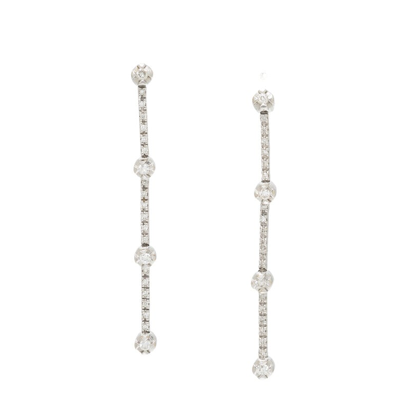 WHITE GOLD AND DIAMOND DROP EARRINGS: WHITE GOLD AND DIAMOND DROP EARRINGS Round diamonds weighing approximately 0.30 carat total. 18 karat white gold. 1 3/4 inches long. Stamp: 750. Gross weight: 2.70 dwt. ConditionOverall Condition: