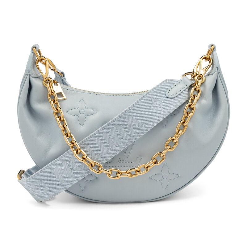LOUIS VUITTON, OVER THE MOON BAG: LOUIS VUITTON, OVER THE MOON BAG Over the Moon bag in powder blue monogram-quilted leather. Zipper closure, removable metal chain handle, removable jacquard strap. Label: Louis Vuitton