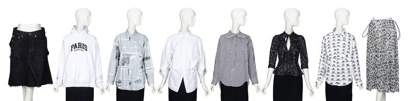 BALENCIAGA, SIX TOPS & TWO SKIRTS: BALENCIAGA, SIX TOPS & TWO SKIRTS THE FIRST Knee-length skirt in black distressed cotton denim. Deconstructed from a pair of jeans and reconstructed into a skirt. Belt loops at waistband.