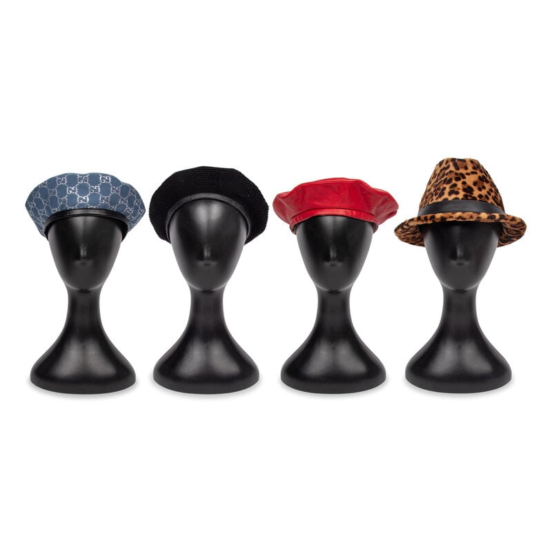 GUCCI, FOUR HATS: GUCCI, FOUR HATS THE FIRST Beret in baby blue & glittery silver wool-blend GG monogram jacquard. Black patent brim with attached black grosgrain tied bow. Fully lined. Label: Gucci Size: S Dat