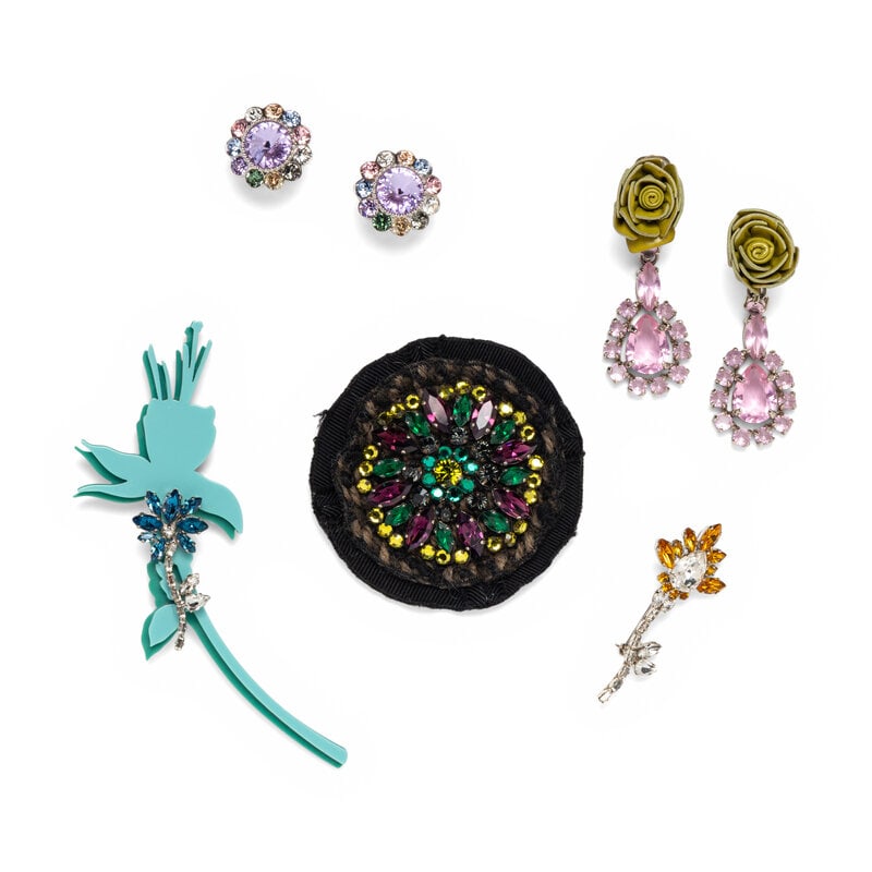 PRADA & MIU MIU, THREE BROOCHES & TWO PAIRS OF EAR CLIPS: PRADA & MIU MIU, THREE BROOCHES & TWO PAIRS OF EAR CLIPS THE FIRST Circular brooch in black grosgrain and tweed with multicolor rhinestone embellishments. Standard pin back. Label: Prada