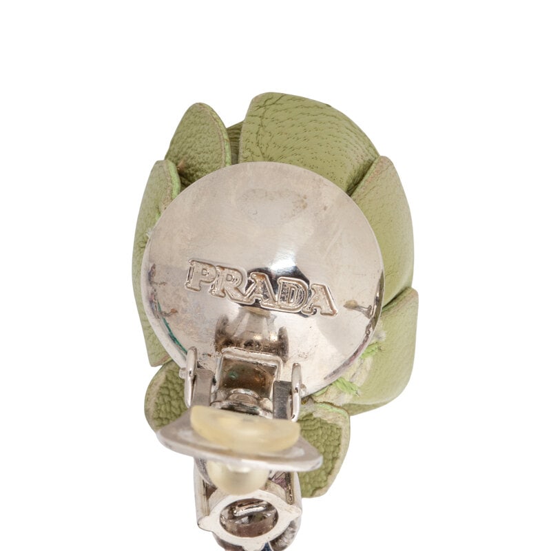 PRADA & MIU MIU, THREE BROOCHES & TWO PAIRS OF EAR CLIPS - 6