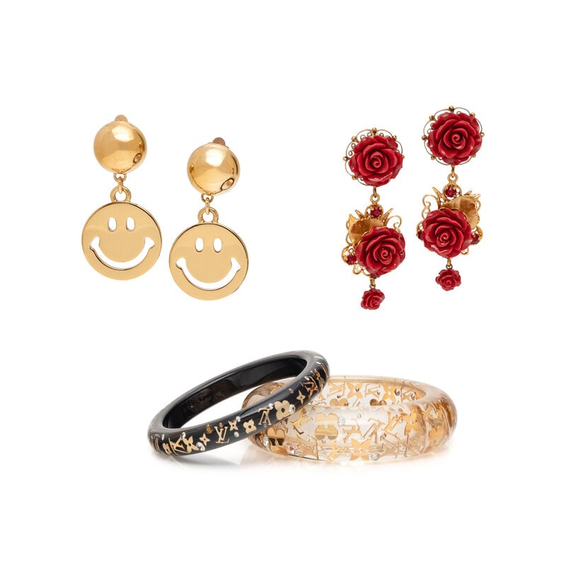 VARIOUS DESIGNER COSTUME JEWELRY INCLUDING LOUIS VUITTON : VARIOUS DESIGNER COSTUME JEWELRY INCLUDING LOUIS VUITTON THE FIRST Two bangles in clear and black resin with gold-tone metal monogram charms encased within. Label: Louis Vuitton Date: 2010's