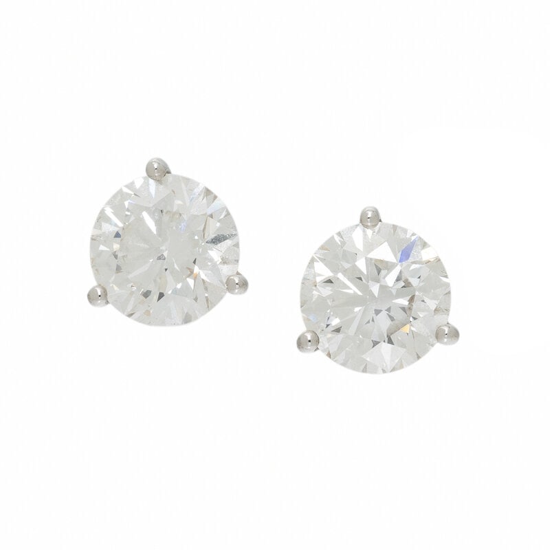 CZ STUD EARRINGS: CZ STUD EARRINGS Round cubic zirconia measuring approximately 8.55 mm. 14 karat white gold. 3/8 inch long. Stamp: 585. Gross weight: 2.20 dwt. Condition Overall