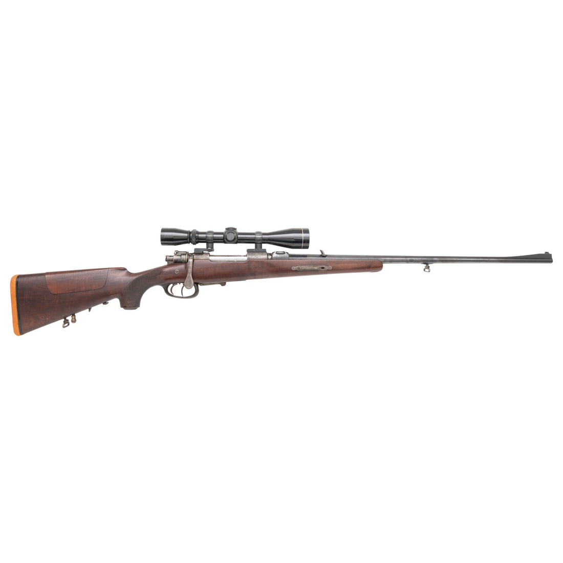 **L. Schiwy Half-Stock Mauser Rifle: **L. Schiwy Half-Stock Mauser Rifle 7x57mm. 26.5" barrel length. SN: 6855. Blued finish with casehardened receiver and small parts mounting a horn triggerguard and walnut semi-pistol grip half-stock w