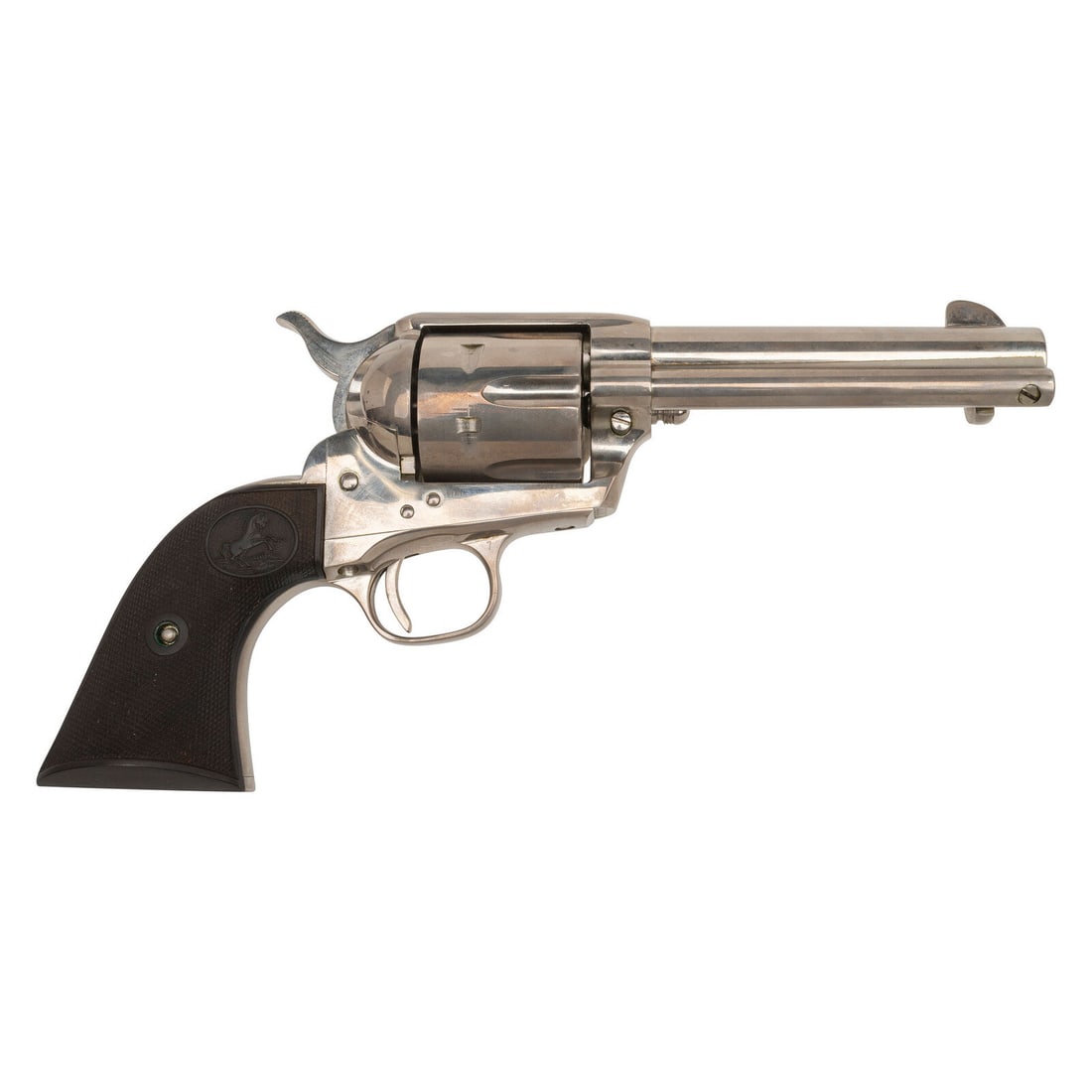 **Nickel Colt Single Action Army Revolver in .45 Colt: **Nickel Colt Single Action Army Revolver in .45 Colt .45 Long Colt. 4.75" barrel length. SN: 38066SA. (Mfg. ca 1963). Nickel plated finish overall mounting {Rampant Colt} logo marked checked black sy