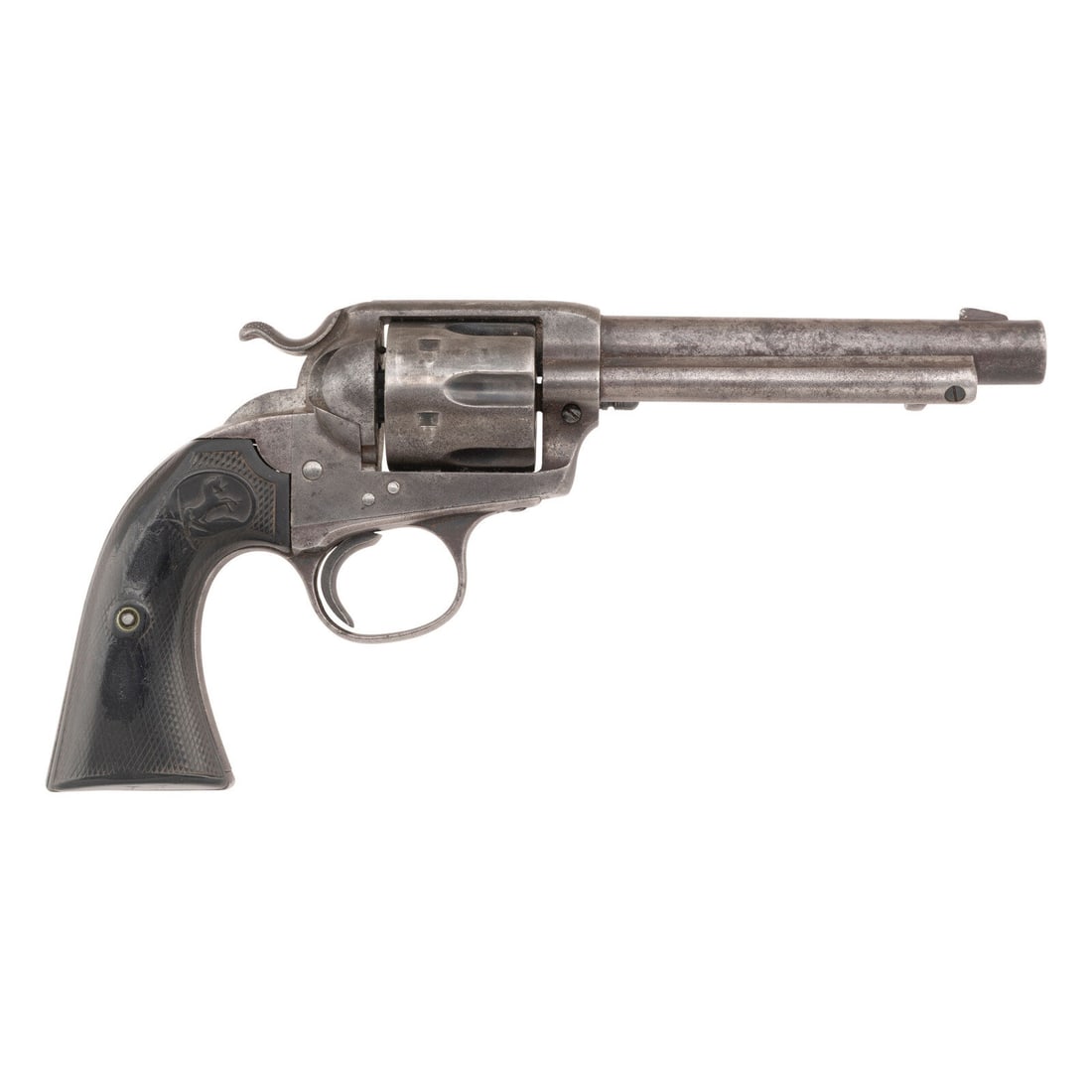 **Colt Bisley Revolver: **Colt Bisley Revolver .45 Long Colt. 5.5" barrel length. SN: 237402. (Mfg ca 1902) Blued and casehardened metal finish faded to a mottled gray to brown patina overall mounting checkered {Rampant Colt