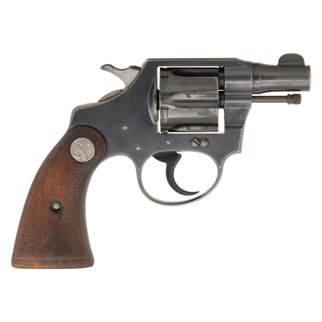**Colt Banker's Special .38 Special Revolver: **Colt Banker's Special .38 Special Revolver .38 Special. 2" barrel length. SN: 361919. (Mfg. Ca 1933) Blued metal finish with polished hammer flanks mounting checkered walnut Colt medallion grips. Do