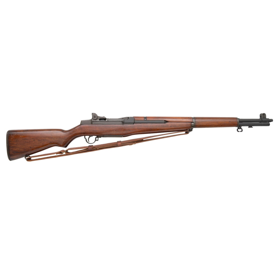 **Springfield M1 Garand Rifle with 1955 Dated Barrel: **Springfield M1 Garand Rifle with 1955 Dated Barrel .30-06. 24" barrel length. SN: 5927534. (Mfg. ca 1955) Parkerized metal finish overall with sanded and varnished walnut semi-pistol grip stock. Lon