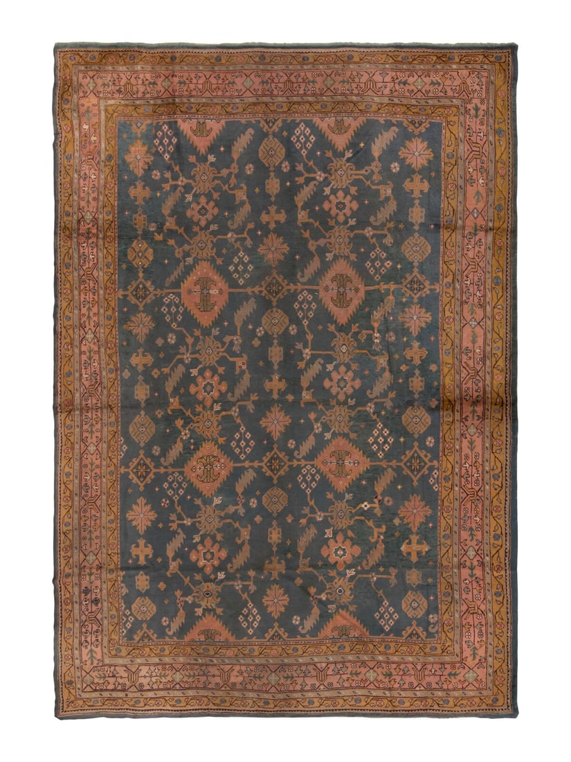 An Oushak Carpet: An Oushak Carpet West Anatolia, Late 19th Century 13 feet 11 inches x 11 feet. Property from a Private Family Trust This lot is located in Chicago.