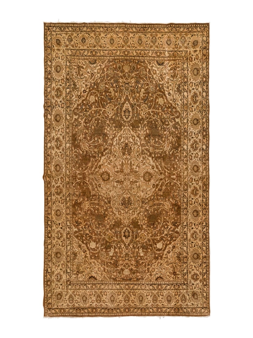 A Tabriz Carpet: A Tabriz Carpet Northwest Persia, Circa 1900 14 feet 1 inch x 9 feet 11 inches. Property from a Private Family Trust This lot is located in Chicago.