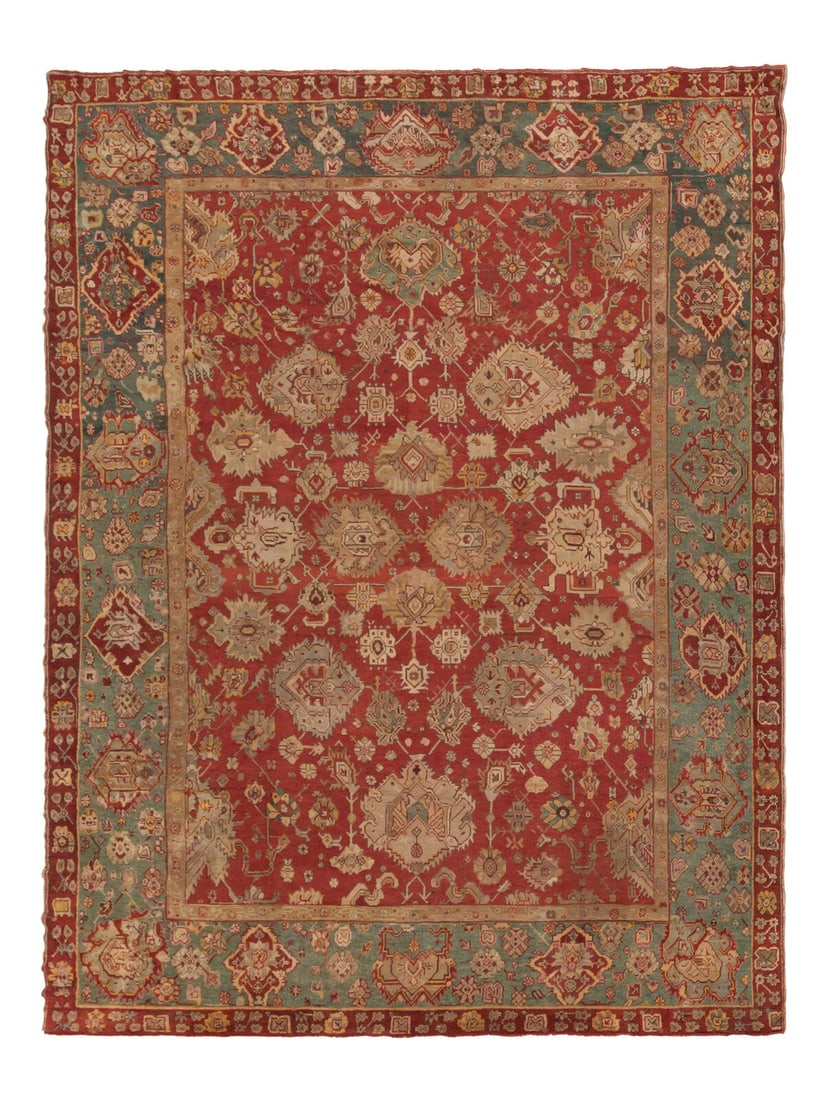 An Oushak Carpet: An Oushak Carpet West Anatolia, Late 19th Century 19 feet 1 inches x 14 feet 5 inches. Property from a Private Family Trust This lot is located in Chicago.