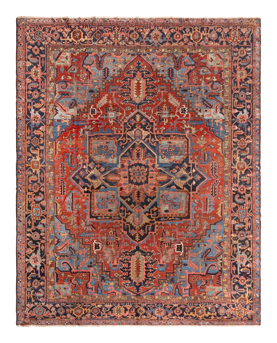 A Heriz Carpet: A Heriz Carpet Northwest Persia, Early 20th Century 13 feet 5 inches x 11 feet 3 inches. Property from a Private Family Trust This lot is located in Chicago.