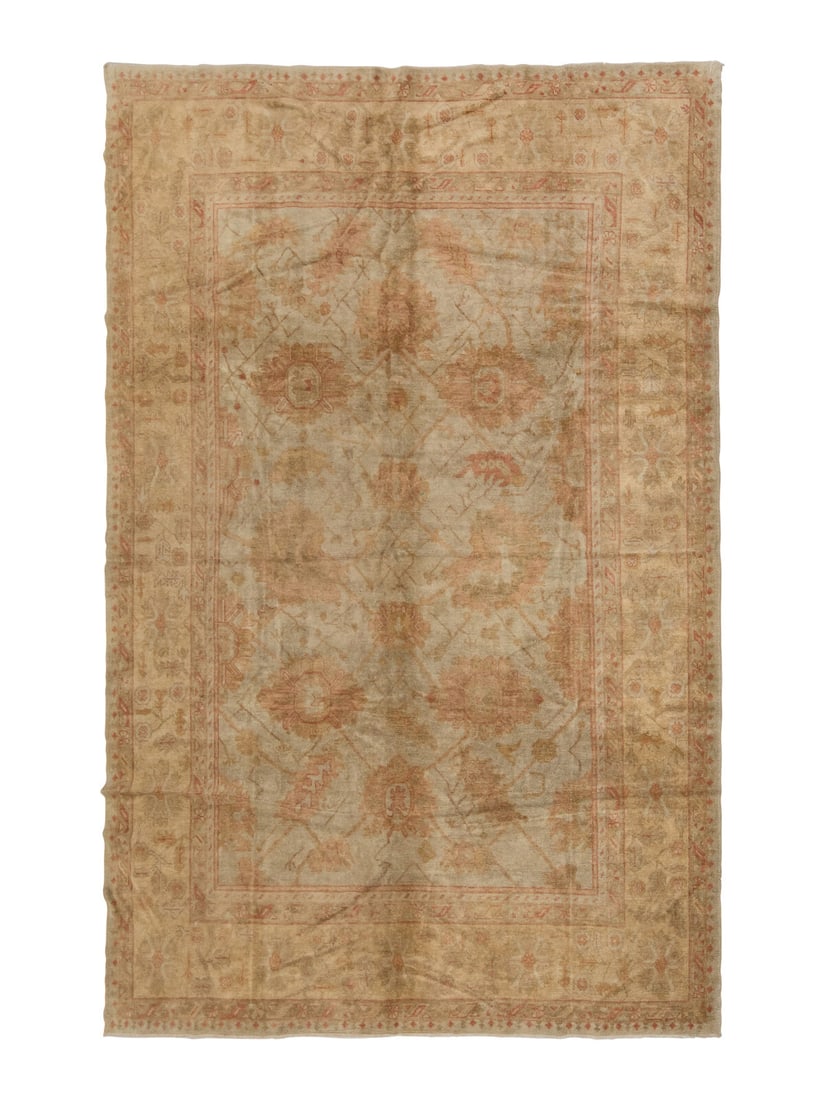 An Oushak Carpet: An Oushak Carpet West Anatolia, Early 20th Century 13 feet x 10 feet 2 inches. Property from a Private Family Trust This lot is located in Chicago.