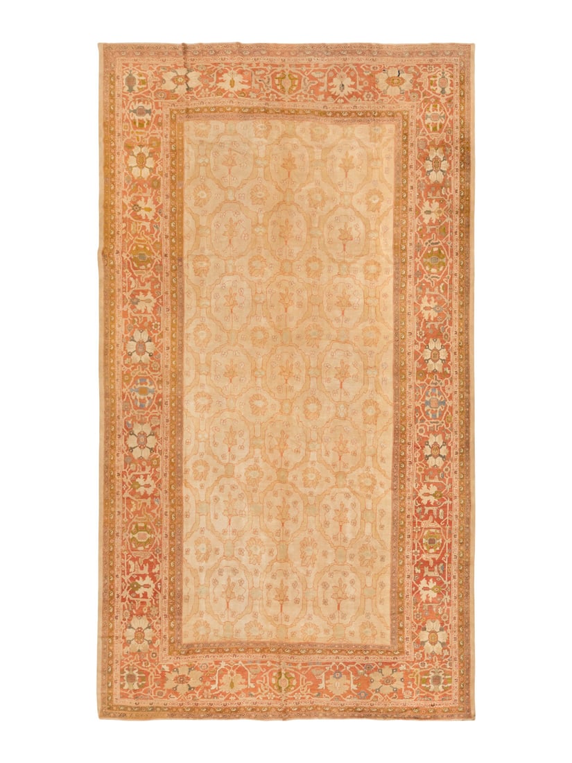 An Indian Carpet: An Indian Carpet Circa 1900 19 feet 3 inches x 13 feet 7 inches. Property from a Private Family Trust This lot is located in Chicago.