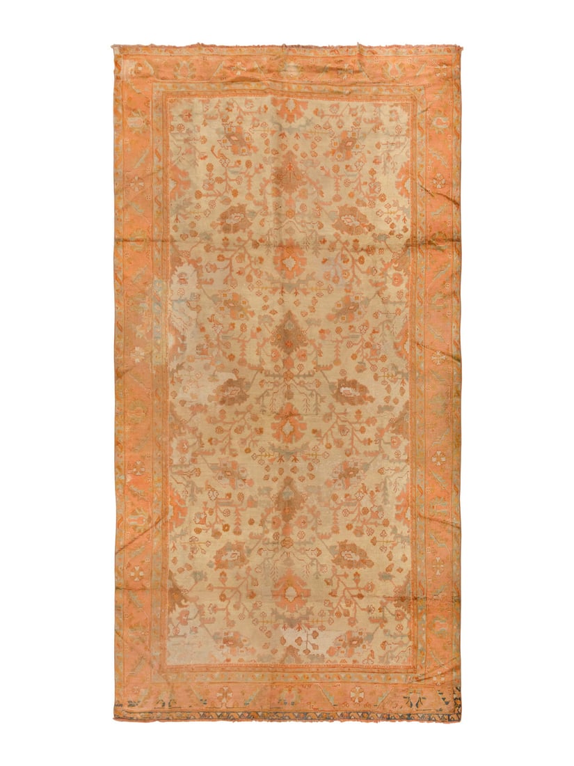 An Oushak Carpet: An Oushak Carpet West Anatolia, Late 19th Century 20 feet 6 inches x 11 feet 10 inches. Property from a Private Family Trust This lot is located in Chicago.