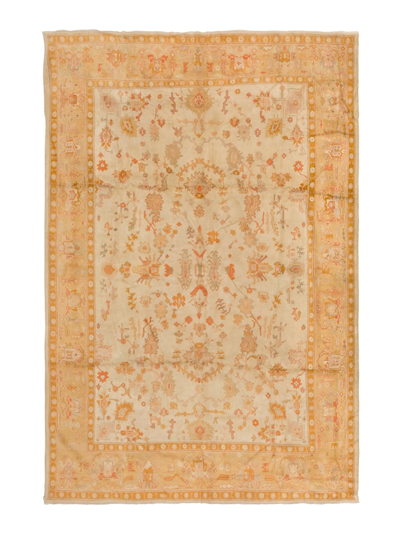 An Oushak Carpet: An Oushak Carpet West Anatolia, Late 19th Century 16 feet 2 inches x 12 feet 8 inches. Property from a Private Family Trust This lot is located in Chicago.