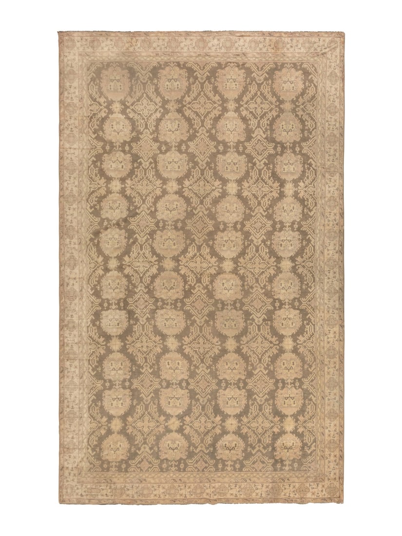 An Oushak Carpet: An Oushak Carpet West Anatolia, Late 19th Century 24 feet 8 inches x 16 feet 8 inches. Property from a Private Family Trust This lot is located in Chicago.