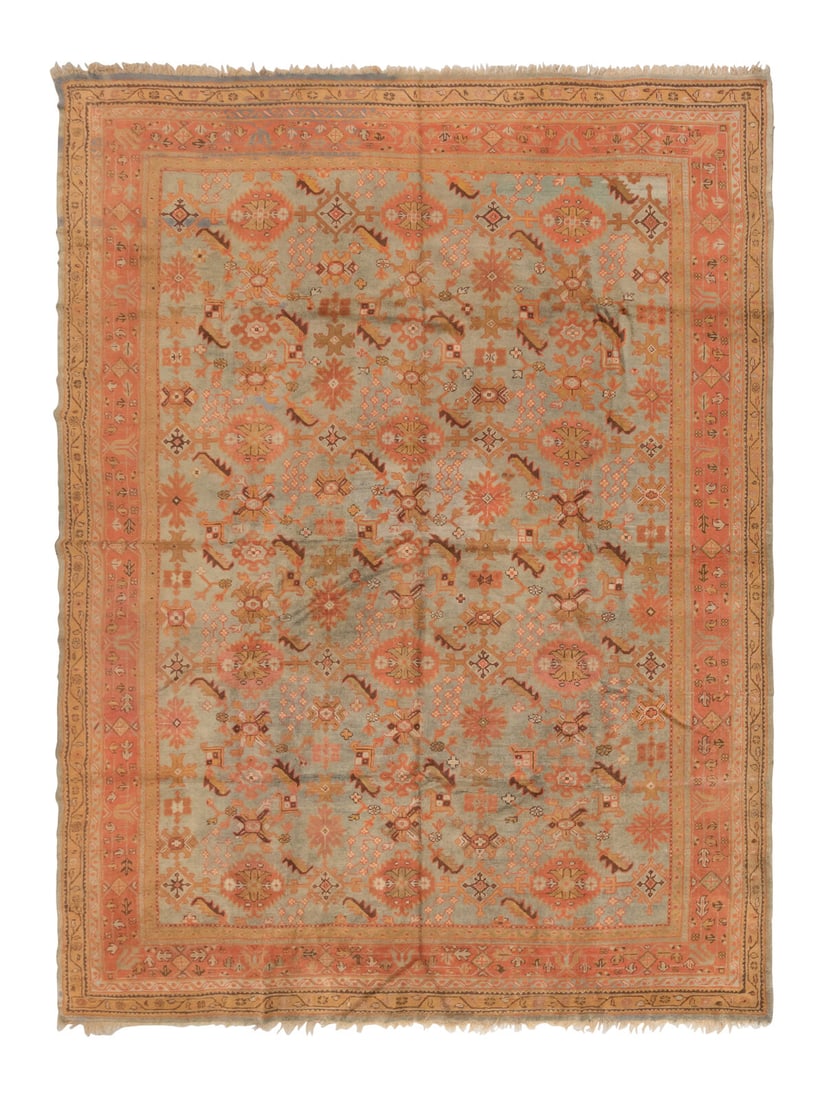 An Oushak Carpet: An Oushak Carpet West Anatolia, Late 19th Century 15 feet 10 inches x 12 feet 2 inches. Property from a Private Family Trust This lot is located in Chicago.