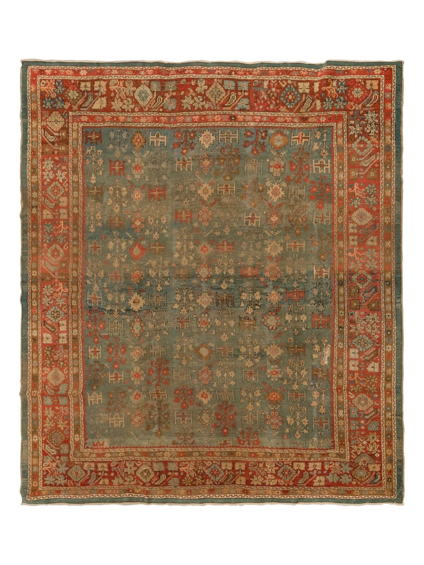 An Oushak Carpet: An Oushak Carpet West Anatolia, Early 20th Century 11 feet 7 inches x 10 feet 5 inches. Property from a Private Family Trust This lot is located in Chicago.
