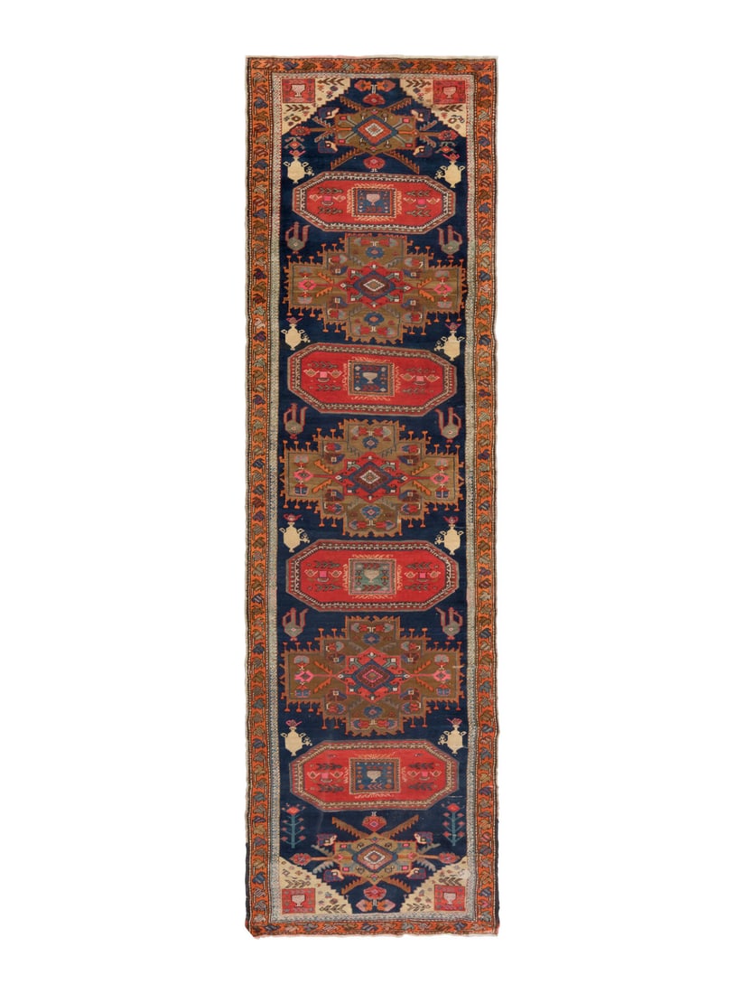 A Northwest Persian Runner: A Northwest Persian Runner 19th/20th Century 14 feet 6 inches x 3 feet 7 inches. Property from a Private Family Trust This lot is located in Chicago.