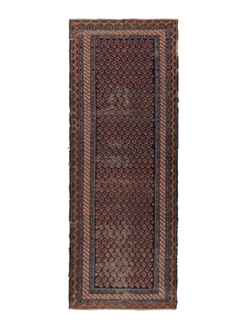 A Northwest Persian Runner: A Northwest Persian Runner Late 19th Century 10 feet 7 inches x 3 feet 5 inches. Property from a Private Family Trust This lot is located in Chicago.