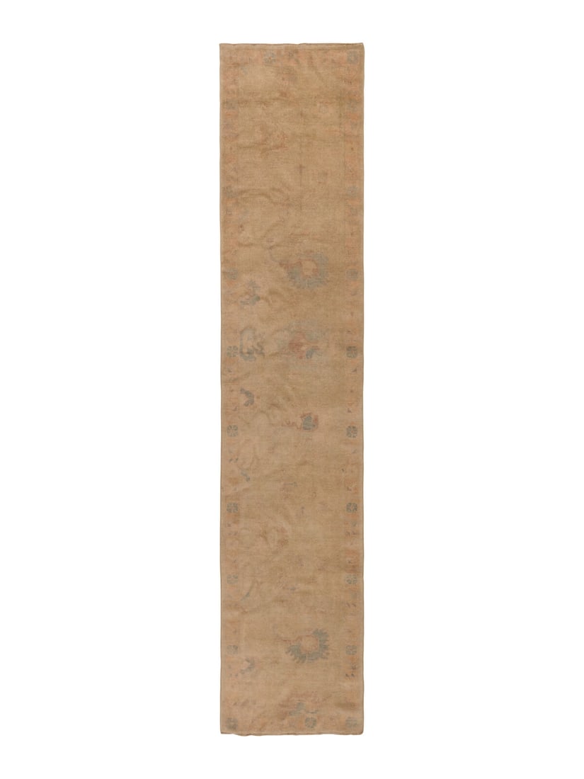 An Oushak Runner: An Oushak Runner West Anatolia, 20th Century 14 feet 7 inches x 3 feet 1 inch. Property from a Private Family Trust This lot is located in Chicago.