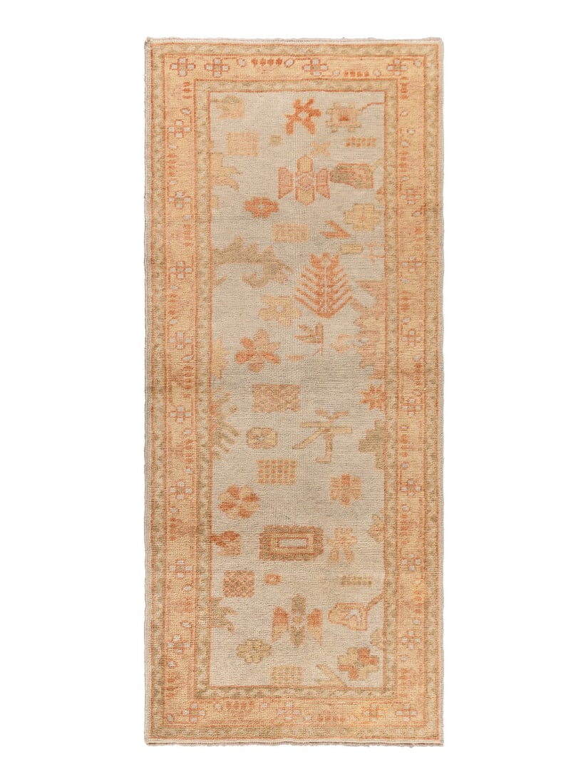 An Oushak Runner: An Oushak Runner West Anatolia, 20th Century 7 feet 5 inches x 3 feet 2 inches. Property from a Private Family Trust This lot is located in Chicago.