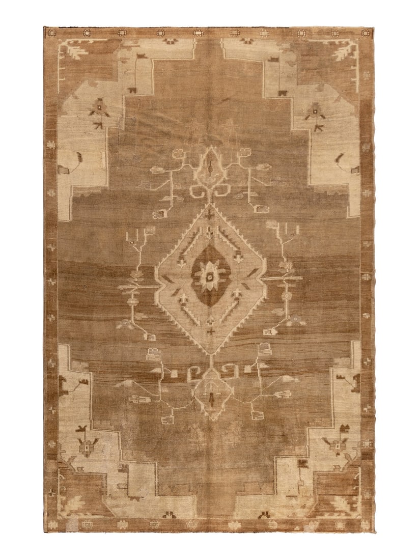An Oushak Rug: An Oushak Rug West Anatolia, Early 20th Century 10 feet 8 inches x 7 feet 7 inches. Property from a Private Family Trust This lot is located in Chicago.