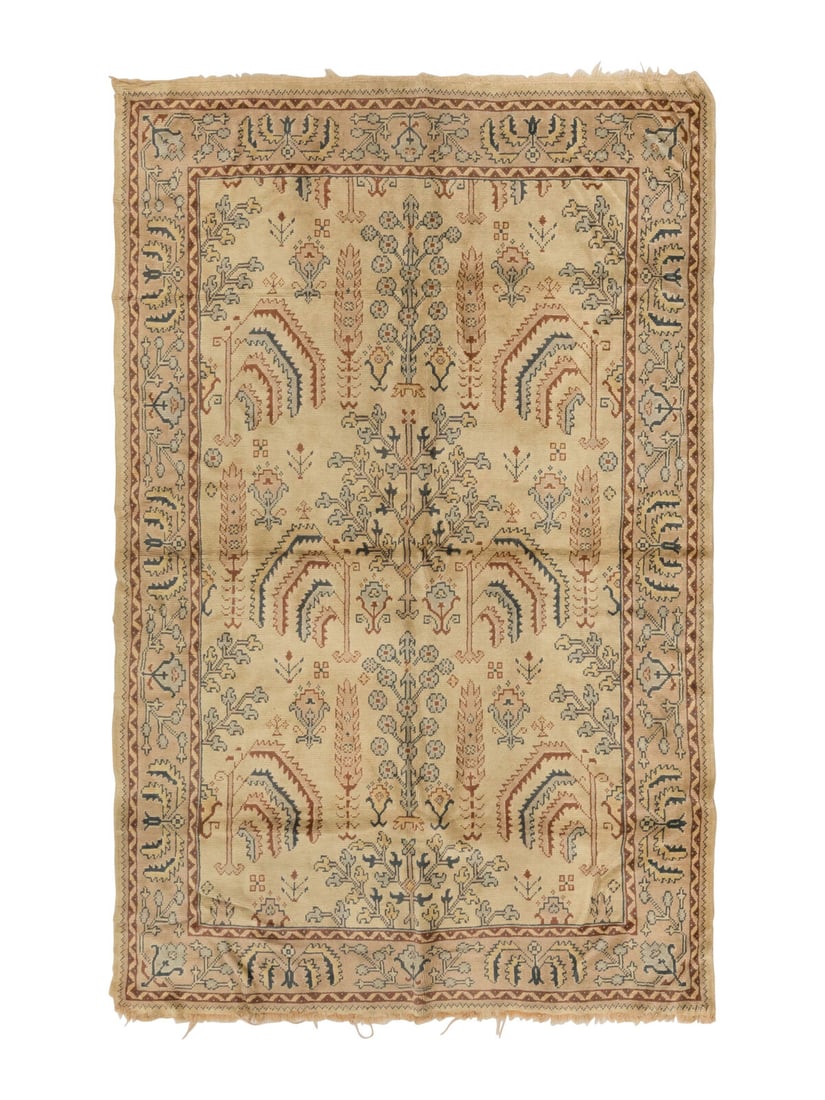 An Oushak Rug: An Oushak Rug First Half 20th Century 9 feet 4 inches x 6 foot 9 inches. Property from a Private Family Trust This lot is located in Chicago.