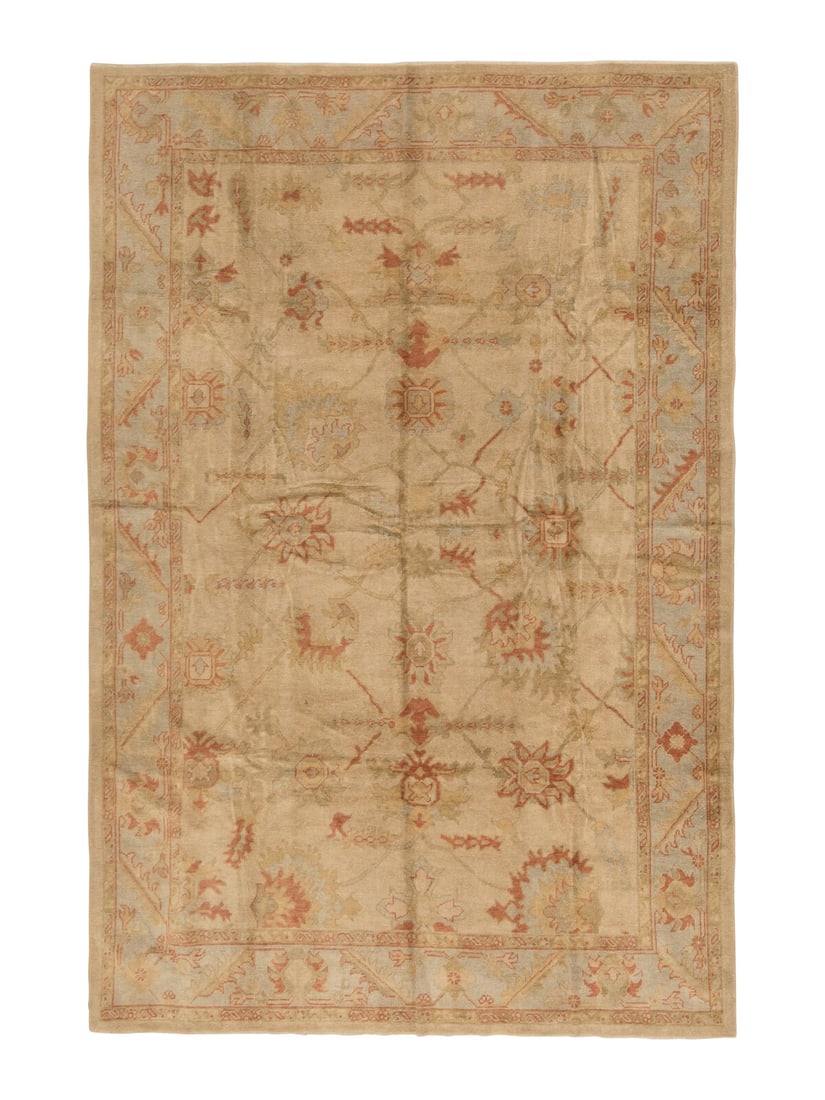 An Oushak Carpet: An Oushak Carpet West Anatolia, Early 20th Century 13 feet 1 inch x 9 feet 7 inches. Property from a Private Family Trust This lot is located in Chicago.