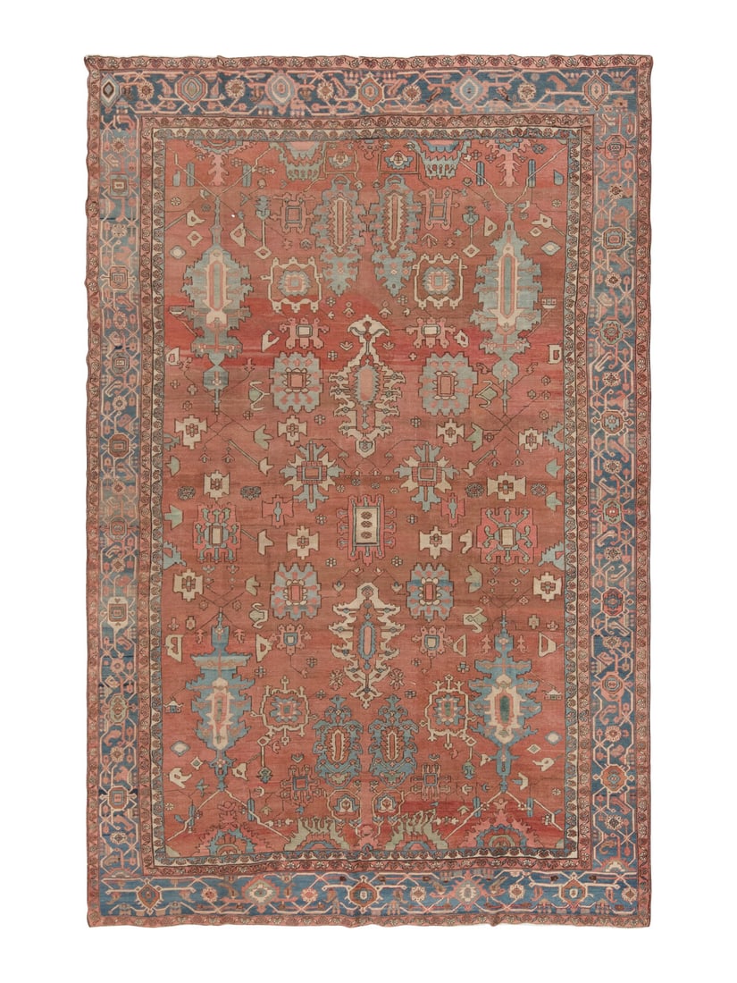 A Heriz Carpet: A Heriz Carpet Northwest Persia, Early 20th Century 14 feet 1 inch x 9 feet 10 inches. Property from a Private Family Trust This lot is located in Chicago.