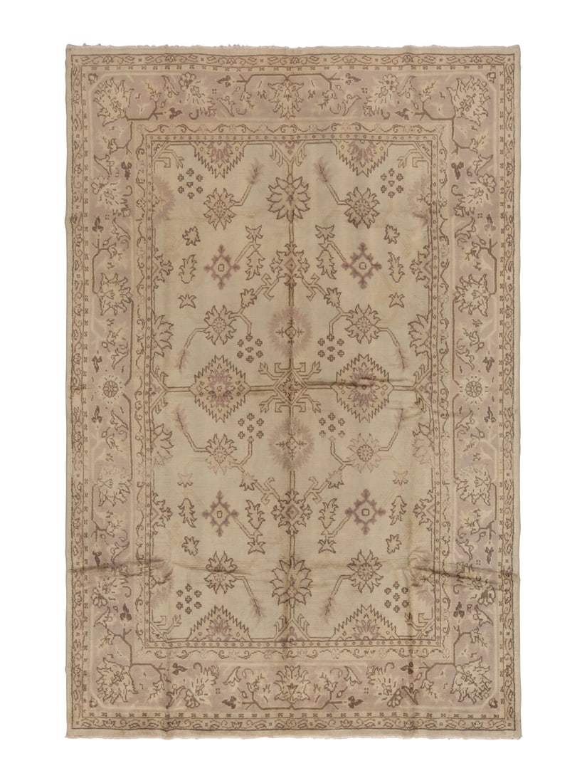 An Oushak Carpet: An Oushak Carpet West Anatolia, Late 19th Century 12 feet 9 inches x 9 feet 5 inches. Property from a Private Family Trust This lot is located in Chicago.