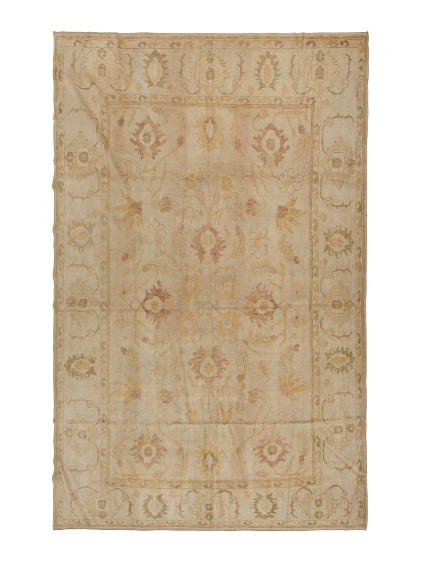 An Oushak Carpet: An Oushak Carpet West Anatolia, Early 20th Century 15 feet x 11 feet 4 inches. Property from a Private Family Trust This lot is located in Chicago.