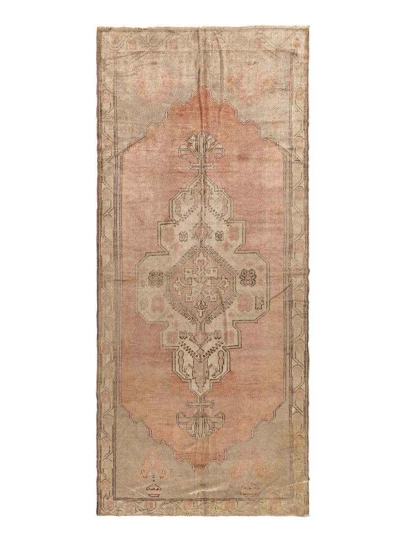 A Khotan Corridor Carpet: A Khotan Corridor Carpet Early 20th Century 10 feet 10 inches x 4 feet 11 inches. Property from a Private Family Trust This lot is located in Chicago.