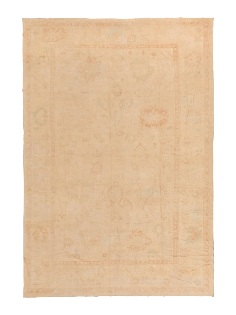 An Oushak Carpet: An Oushak Carpet West Anatolia, Early 20th Century 26 feet 8 inches x 18 feet 5 inches. Property from a Private Family Trust This lot is located in Chicago.