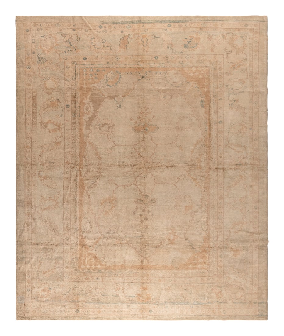 An Oushak Carpet: An Oushak Carpet West Anatolia, 20th Century 12 feet x 10 feet 1 inch. Property from a Private Family Trust This lot is located in Chicago.