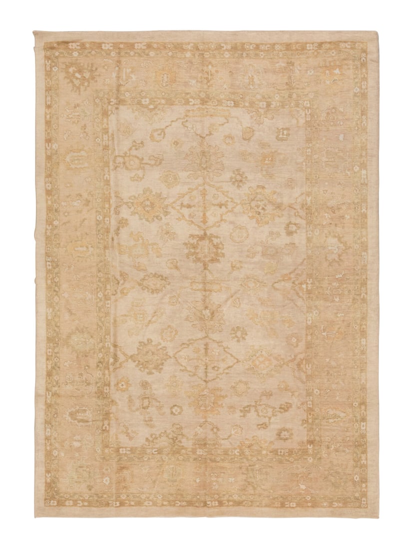 An Oushak Carpet: An Oushak Carpet West Anatolia, Late 19th Century 13 feet 5 inches x 9 feet 2 inches. Property from a Private Family Trust This lot is located in Chicago.