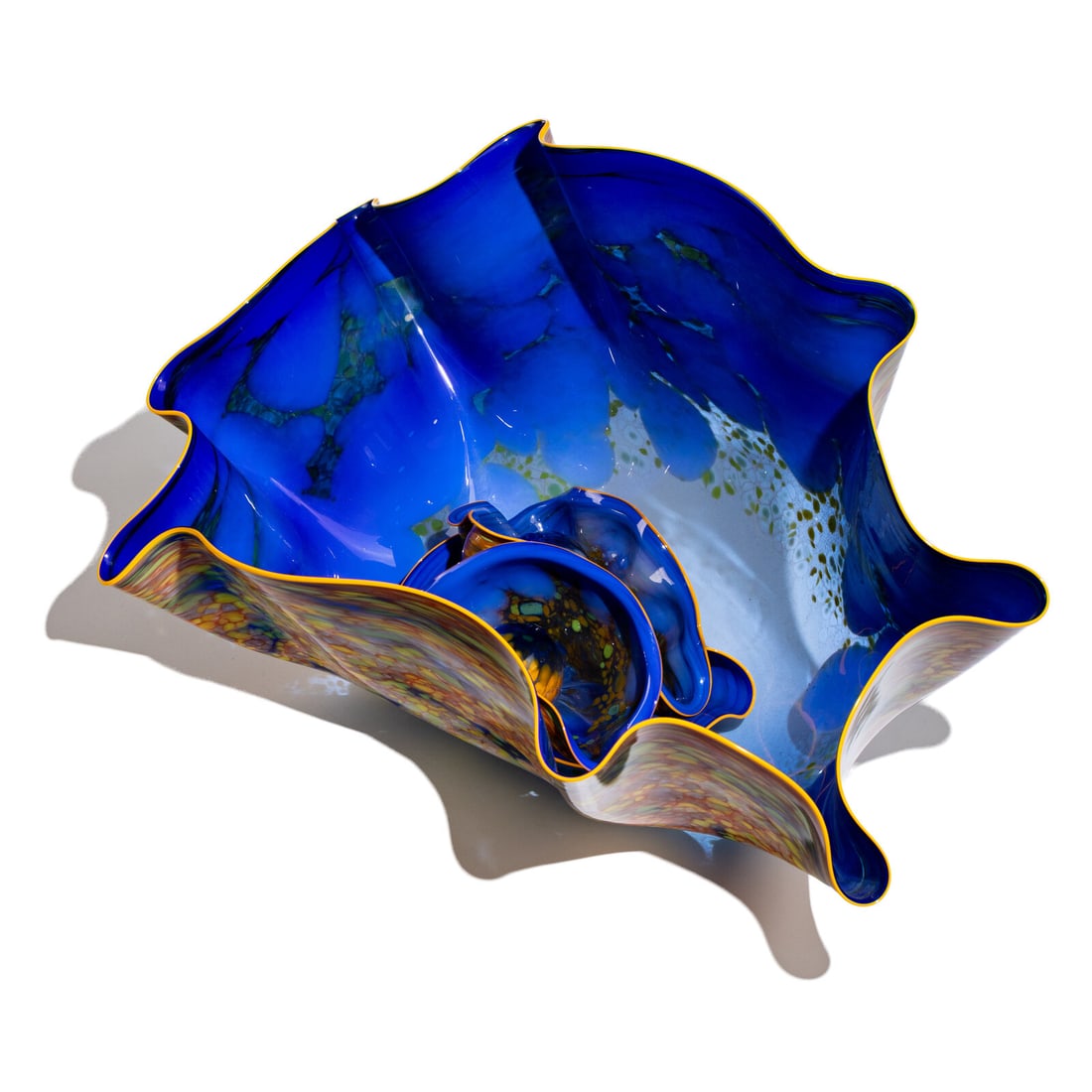 Dale Chihuly (American, b. 1941) Blue Macchia Seaform Set with Yellow Lip Wraps, 1986 (1 of 7)