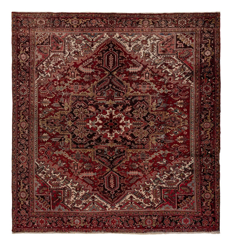 A Heriz Rug: A Heriz Rug Circa 1930-40 9 feet 7 inches x 9 feet. Property from a Private Family Trust This lot is located in Cincinnati. ConditionRetaining fairly even color throughout with a mostly consistent