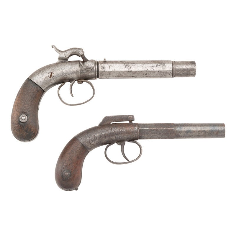 Two Single Shot Percussion Pistols: Bacon Bar Hammer & Stocking: Two Single Shot Percussion Pistols: Bacon Bar Hammer & Stocking 1.) .36 Cal. 4.5" barrel length. SN: NSN. Buffed bright metal finish with bag shaped two-piece walnut grips mounting rear notch