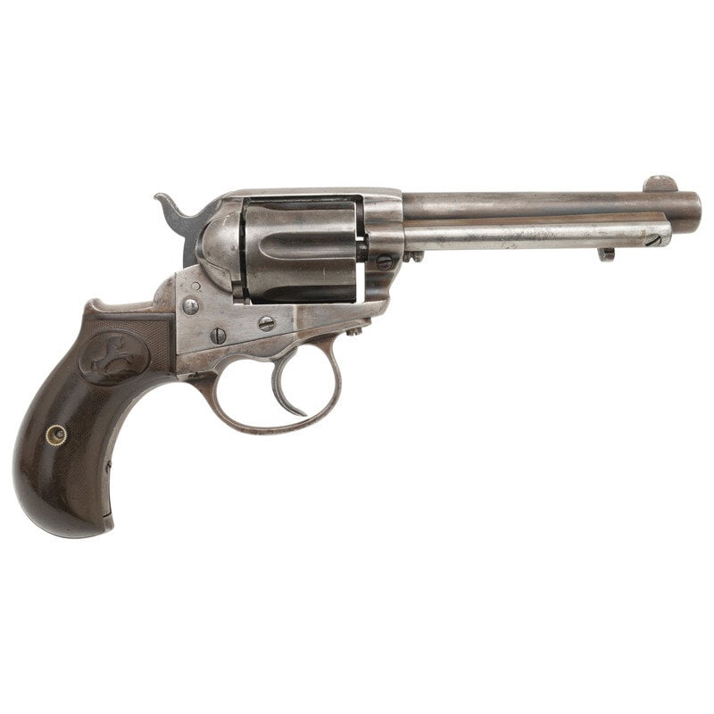 Colt Model 1877 Lightning Revolver: Colt Model 1877 Lightning Revolver .38 Long Colt. 4.5" barrel length. SN: 84704. (Mfg. ca 1891) Blued and casehardened finish with checkered hardrubber Rampant Colt logo birdshead grips. Double action