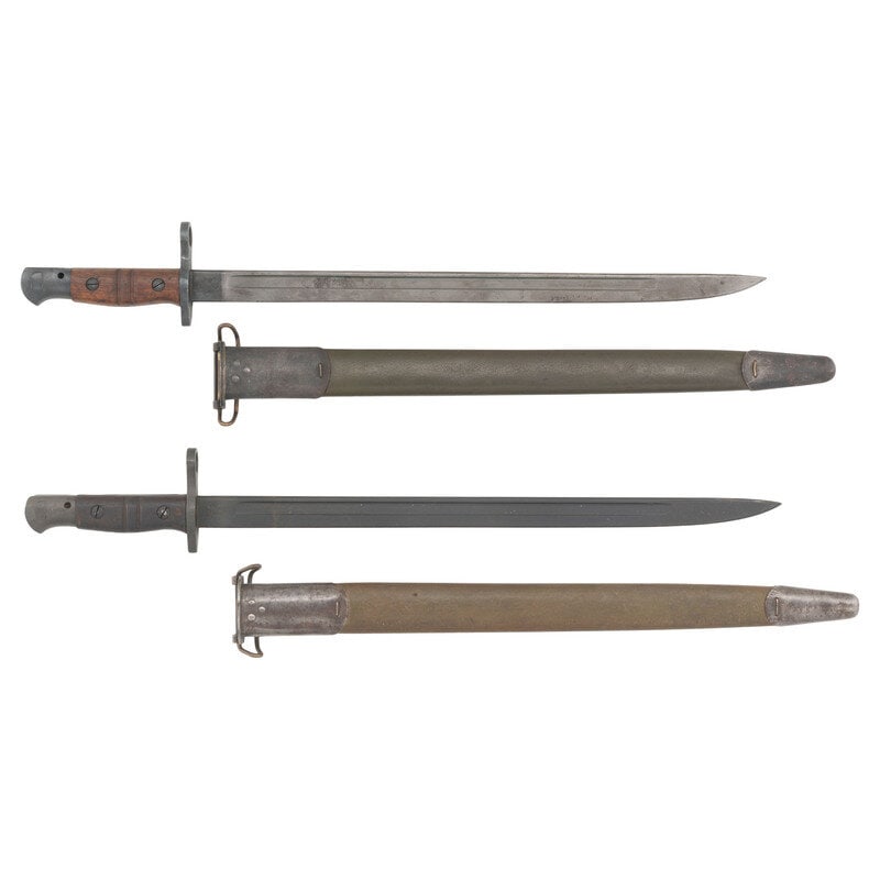 Two Remington M1917 Bayonets & Scabbards: Two Remington M1917 Bayonets & Scabbards World War I 1) Remington M1917 Bayonet & Scabbard. 16.875" lightly Parkerized gray blade with blued ricasso, 21.675" overall. Screw retained grooved