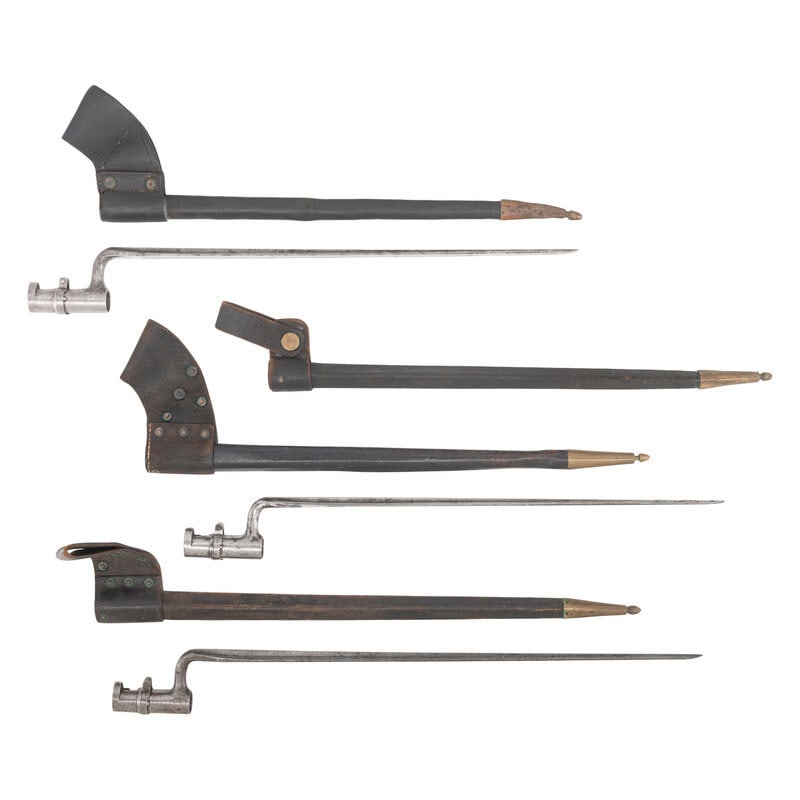 Two US M1855 Socket Bayonets, One M1865 Joslyn Rifle Bayonet & Four Scabbards: Two US M1855 Socket Bayonets, One M1865 Joslyn Rifle Bayonet & Four Scabbards American Civil War 1) US Model 1865 Joslyn Rifle Socket Bayonet. 20" blade, 3" socket, 23" in overall length. Bright