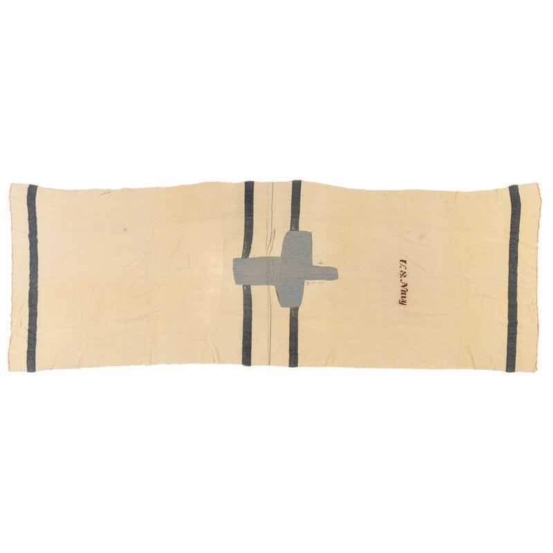 19th Century US Navy Blanket: 19th Century US Navy Blanket 49" x 139". Cream and navy blue wool blanket with blue borders and edges bound in red thread, suggesting it is likely Post Civil War. The blanket is patched with a